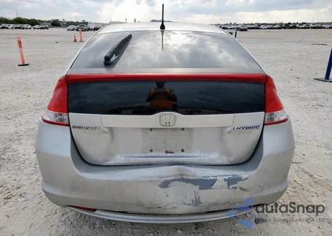 2010 Honda Insight Ex from USA, damaged, VIN JHMZE2H75AS021646